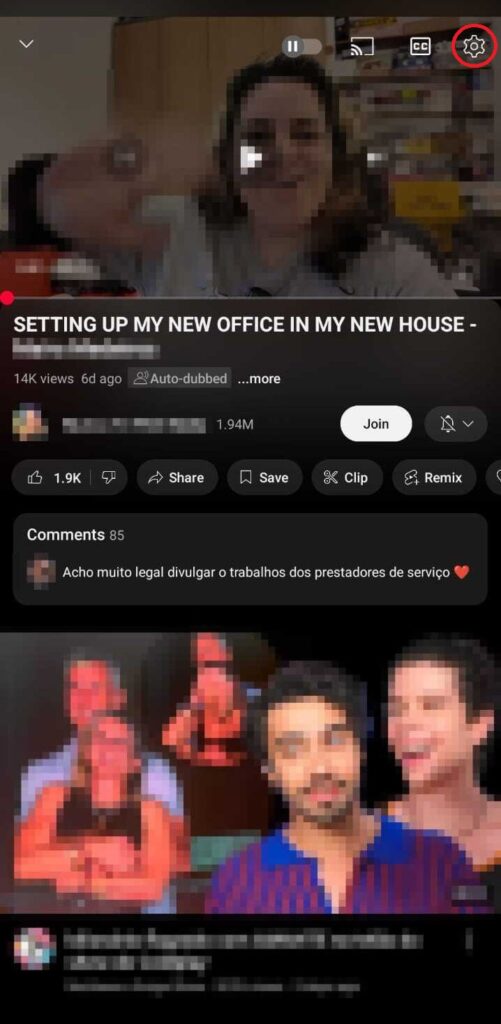 YouTube video showing the settings icon in the top-right corner, highlighted in red